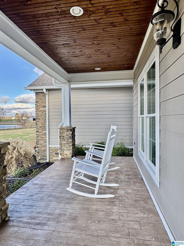 view of patio featuring a porch