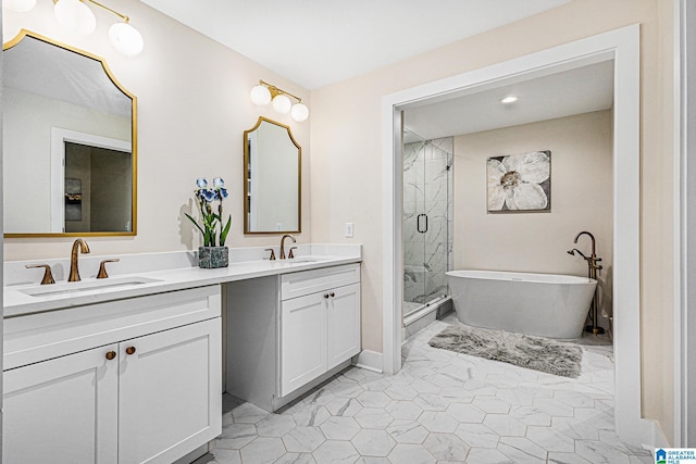 bathroom with tile patterned flooring, vanity, and shower with separate bathtub