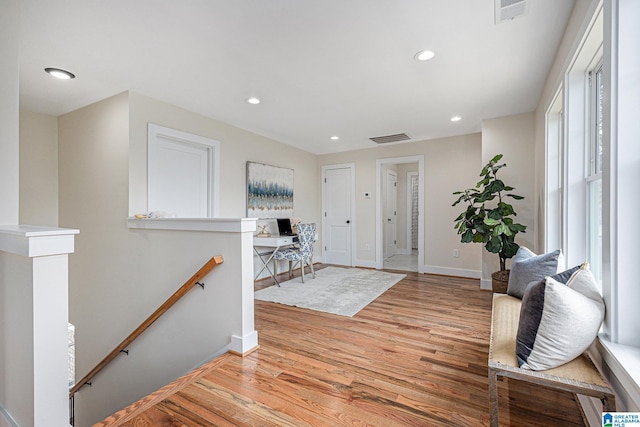 foyer with light wood-type flooring