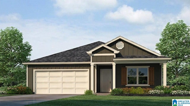 view of front of home featuring a front lawn and a garage