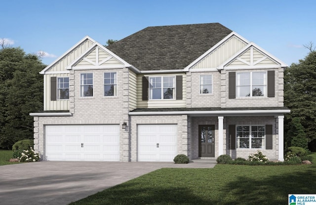 view of front of home with a garage and a front lawn