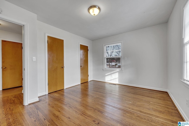 empty room with light wood-type flooring