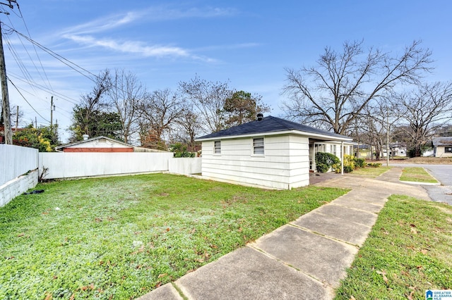 view of yard with a carport