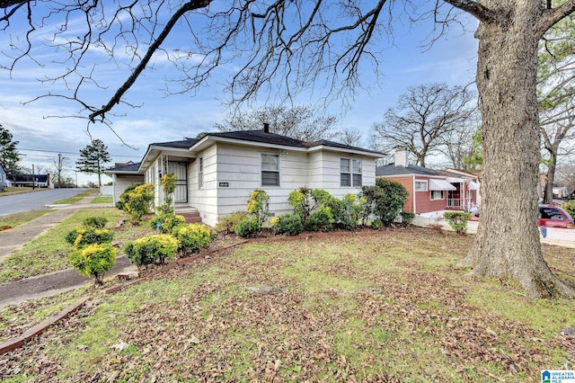 view of property exterior featuring a yard