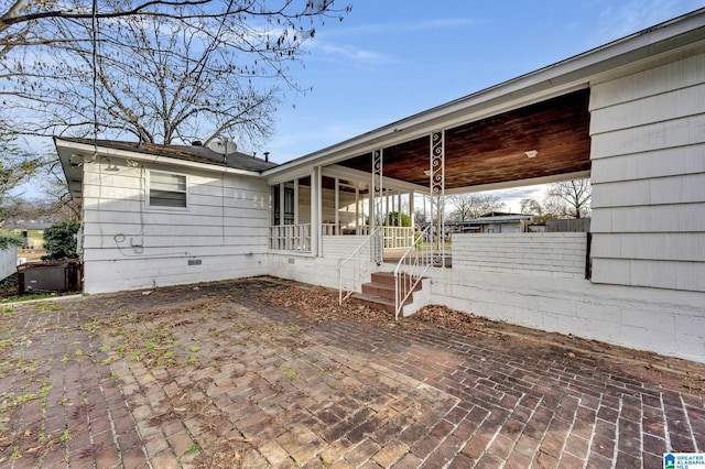 view of property exterior with a porch