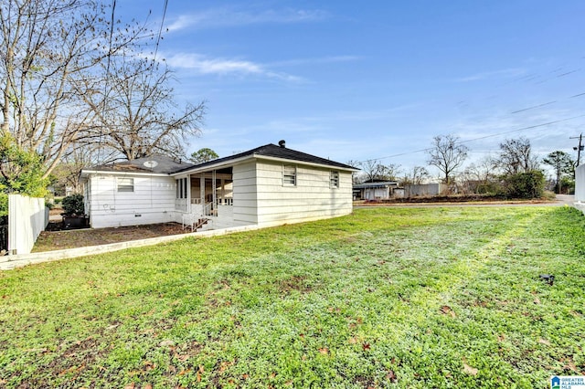 exterior space featuring a lawn