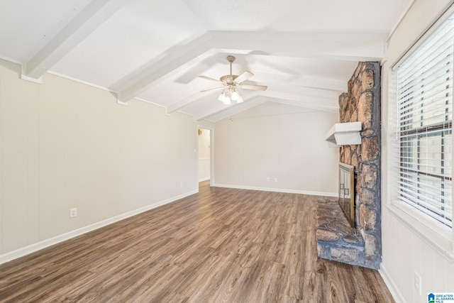 unfurnished living room featuring vaulted ceiling with beams, ceiling fan, a fireplace, and wood-type flooring