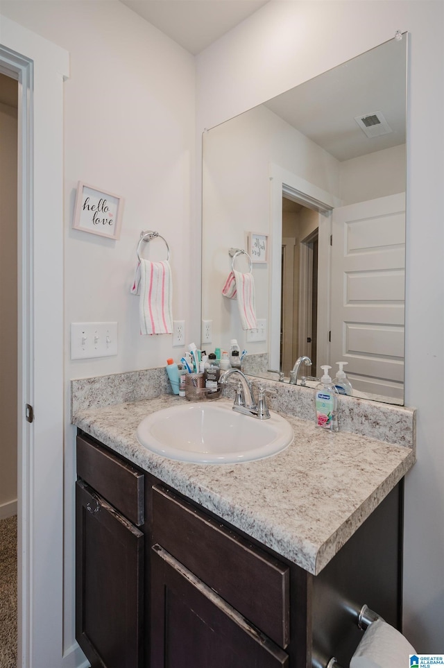 bathroom featuring vanity