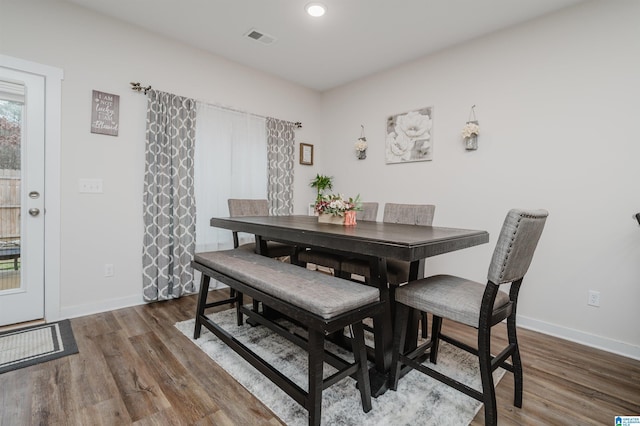 dining room featuring dark wood-type flooring