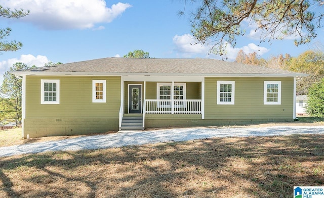 ranch-style house featuring a porch