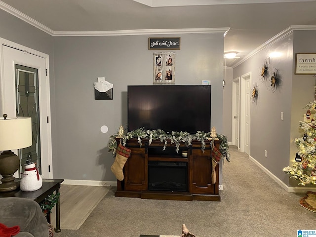 living room with crown molding and light colored carpet