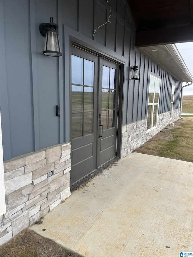 property entrance with a patio