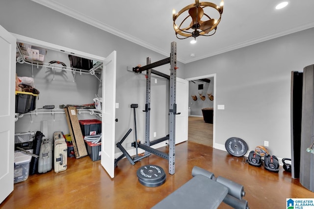 exercise room featuring crown molding and an inviting chandelier