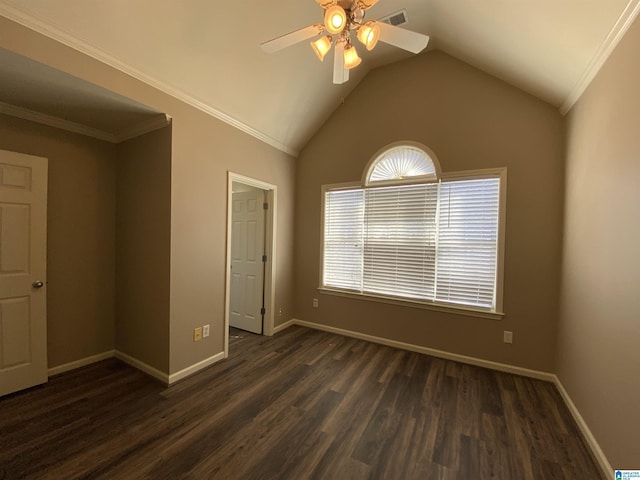 spare room with dark hardwood / wood-style floors, crown molding, ceiling fan, and lofted ceiling