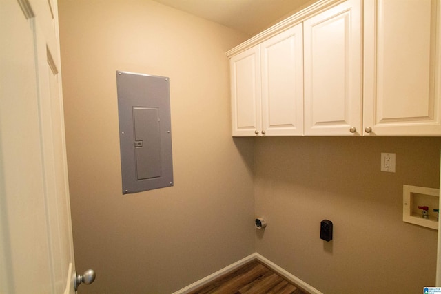 laundry room with electric panel, dark wood-type flooring, cabinets, and washer hookup