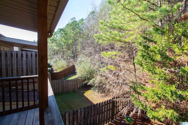 view of yard with a wooden deck