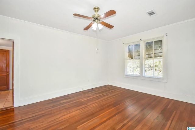 unfurnished room featuring hardwood / wood-style floors, ceiling fan, and ornamental molding