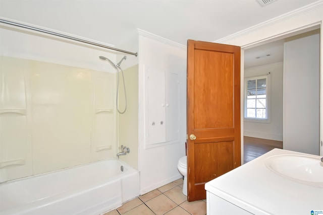 full bathroom featuring vanity, shower / tub combination, tile patterned flooring, toilet, and ornamental molding