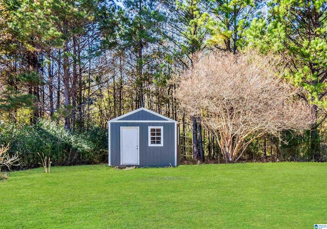 view of outdoor structure with a lawn