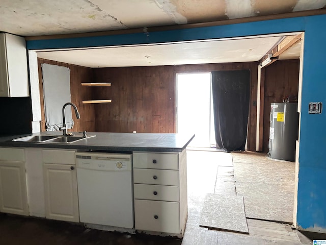 kitchen with dishwasher, electric water heater, white cabinets, and sink