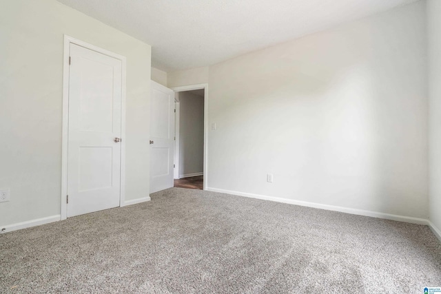 unfurnished bedroom featuring carpet flooring