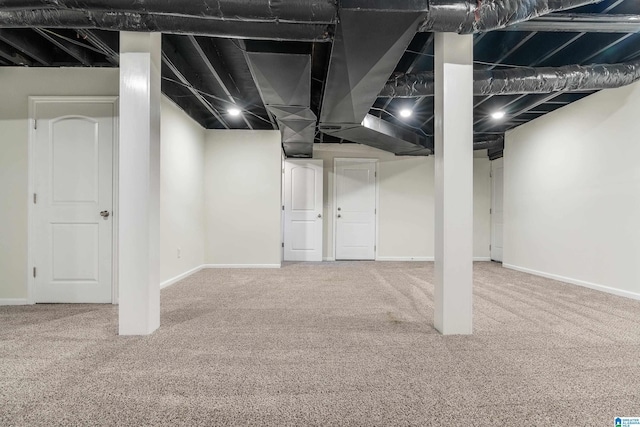 basement with carpet flooring