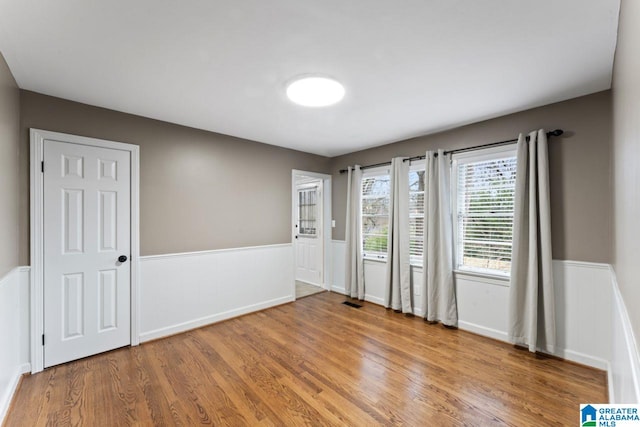 empty room featuring hardwood / wood-style floors