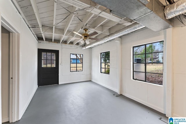 interior space featuring ceiling fan