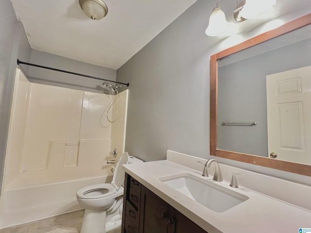 full bathroom featuring vanity, bathtub / shower combination, and toilet