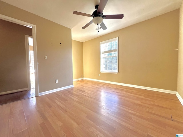 unfurnished room with light hardwood / wood-style floors and ceiling fan