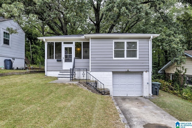 view of front facade featuring a garage and a front lawn