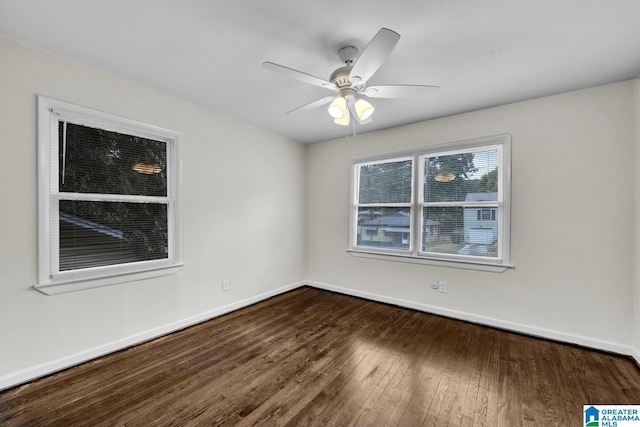 unfurnished room with hardwood / wood-style floors and ceiling fan