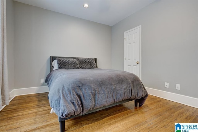 bedroom featuring hardwood / wood-style flooring