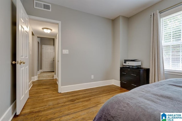 bedroom featuring light hardwood / wood-style floors