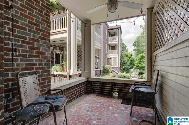 sunroom / solarium with ceiling fan