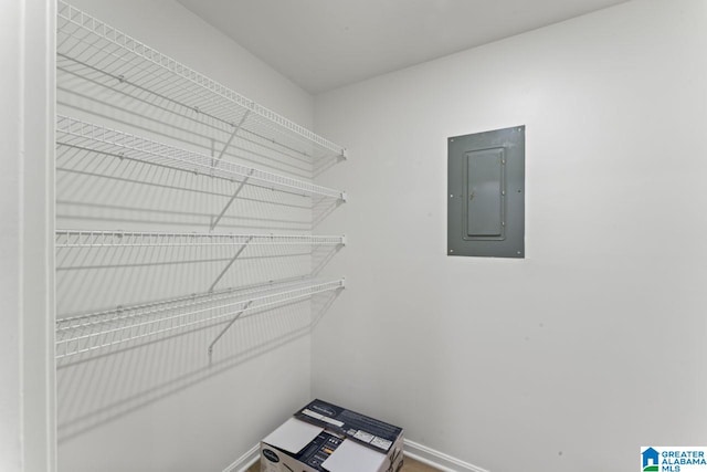 spacious closet featuring electric panel