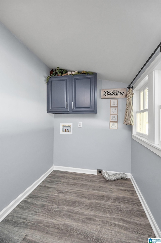 washroom with cabinets, washer hookup, dark hardwood / wood-style flooring, and electric dryer hookup