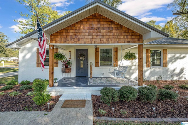 bungalow-style house featuring covered porch