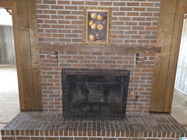 interior details with a fireplace and carpet floors