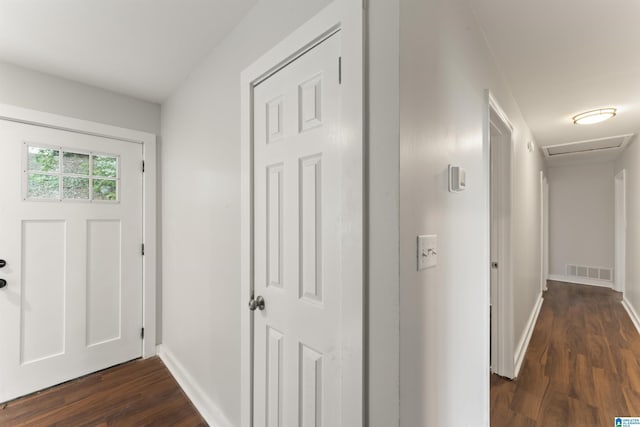 foyer entrance with dark wood-type flooring