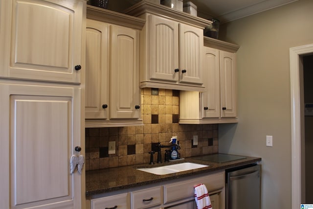 kitchen featuring sink, dishwasher, dark stone countertops, backsplash, and ornamental molding