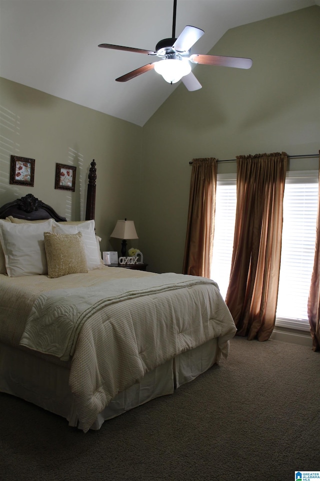 bedroom featuring ceiling fan, lofted ceiling, and carpet