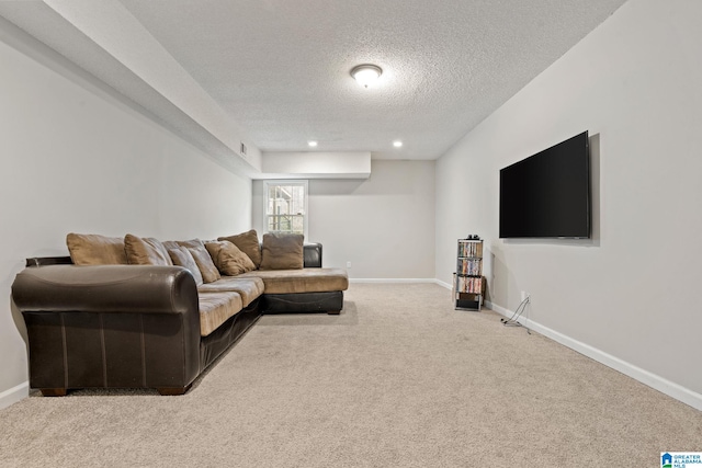 living room with light carpet and a textured ceiling