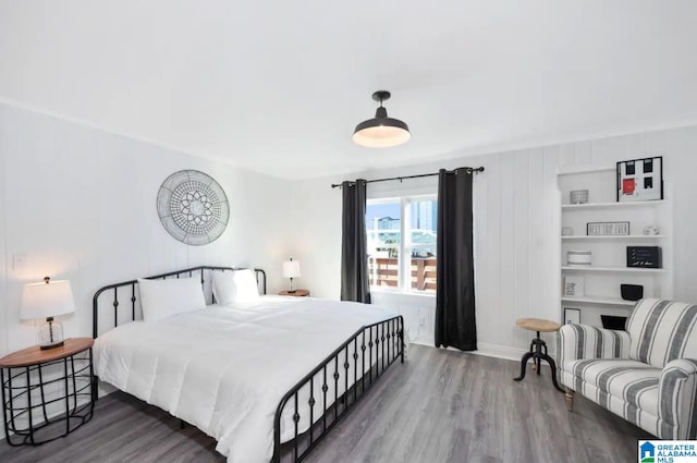 bedroom featuring hardwood / wood-style floors