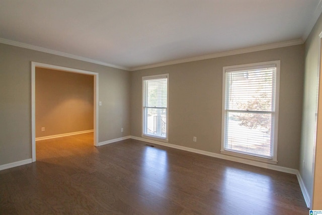 unfurnished room with dark wood-type flooring and ornamental molding