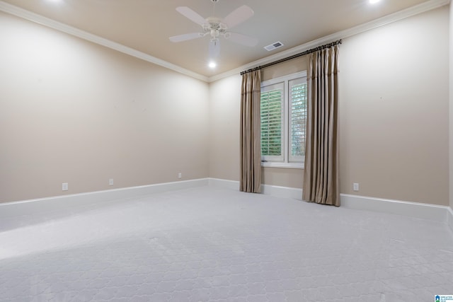 unfurnished room with ceiling fan, carpet, and ornamental molding