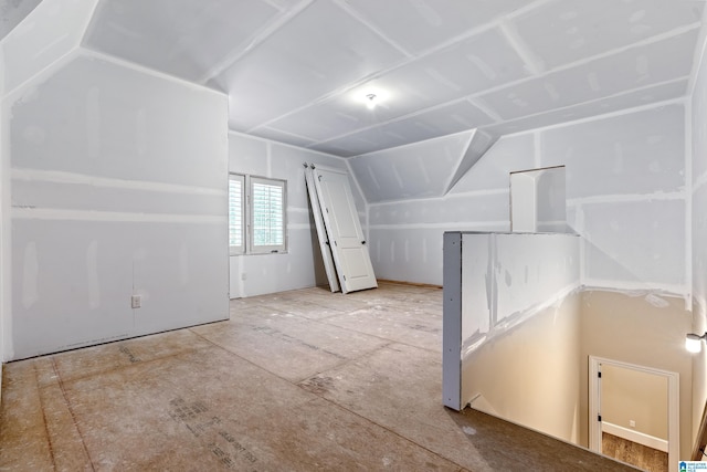 additional living space with lofted ceiling