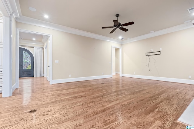 unfurnished living room with ceiling fan, light wood-type flooring, and crown molding