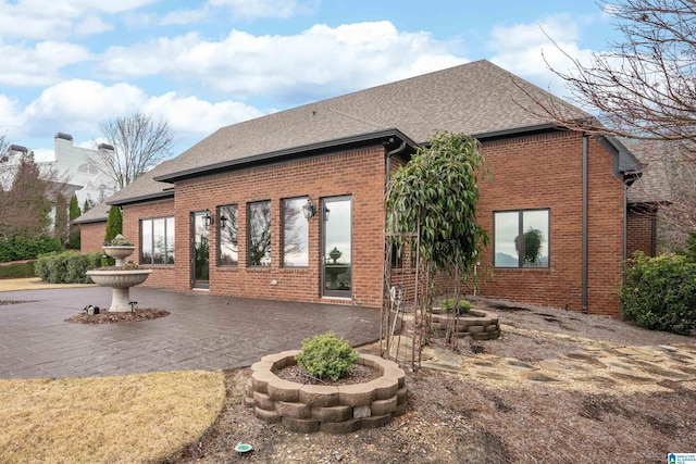 rear view of house featuring a patio area