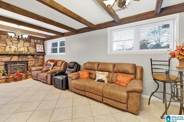 tiled living room with a wood stove, beamed ceiling, and a chandelier